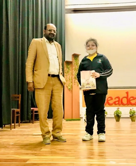 ICTS Leadership Presenting Student Excellence Award on Stage